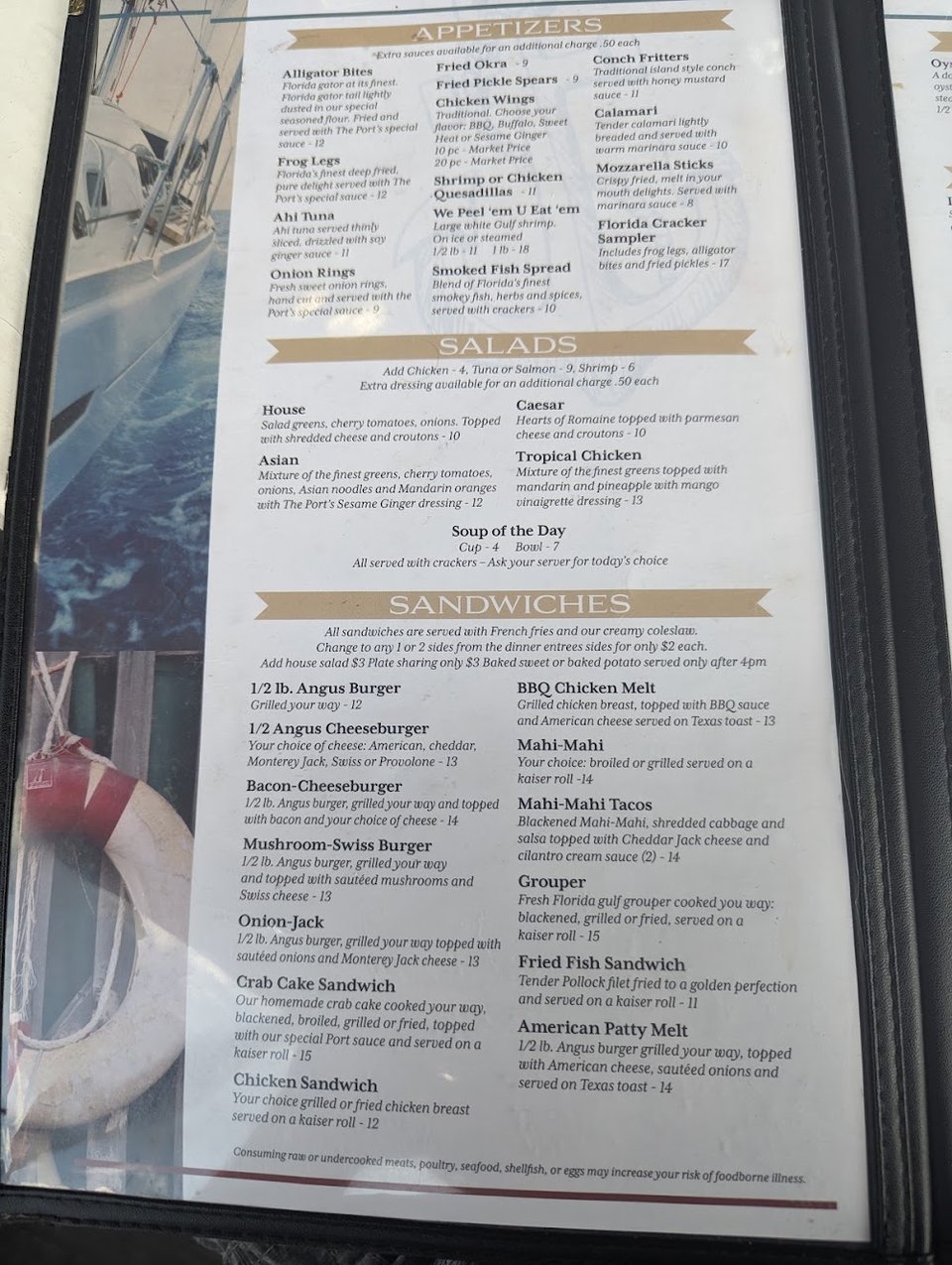 Menu layout featuring burgers and seafood plates.